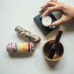 Florida Witch Doctor in USA - Candle, dry herbs and mortar with pestle